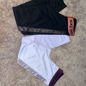 2 pairs Nike Pro leggings size md womens
